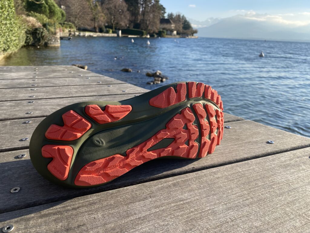 Picture of Asics GT 2000 v13 TR outer sole on wooden pontoon by lake 