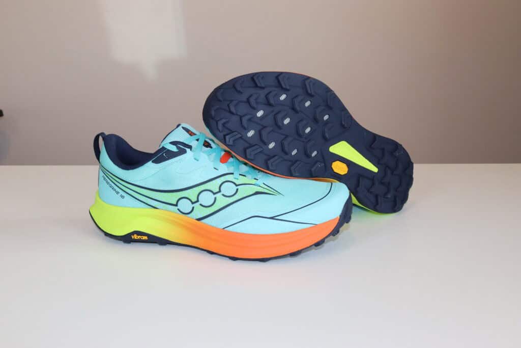 Picture of outside of left shoe and sole of right shoe, saucony pergrine 16